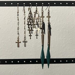 3 for 1 price. Cross gold earrings.
